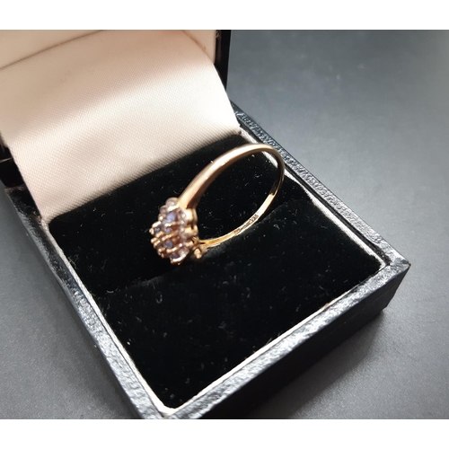 19 - A hallmarked 9ct yellow gold ladies ring with inset amethyst and CZ stones - size P ½ and approx. 2.... 