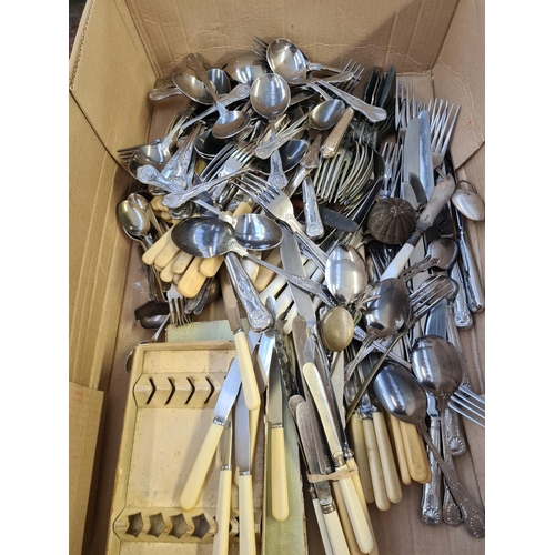 203 - Two boxes containing a large quantity of cutlery