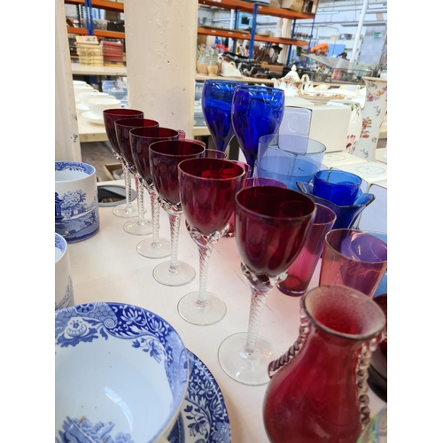 214 - Assorted glassware to include ruby red sherry glasses with twisted stem, cranberry glass beakers, Mu... 