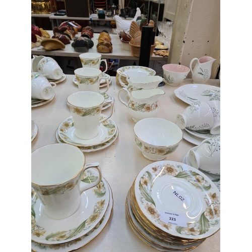 223 - Approx. 145 pieces of Duchess Greensleeves tea and dinnerware