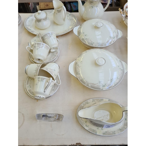 230 - Approx. 44 pieces of Royal Doulton Kathleen tea and dinner ware from the Romance Collection and a We... 