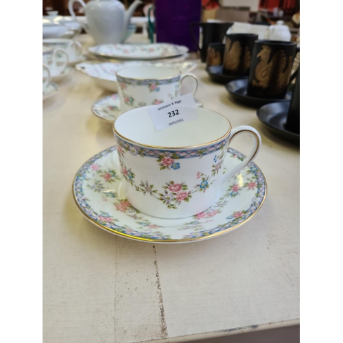 232 - A 26 piece Coalport Trellis Rose part tea set comprising 10 tea cups, 12 saucers, 3 cake plates and ... 