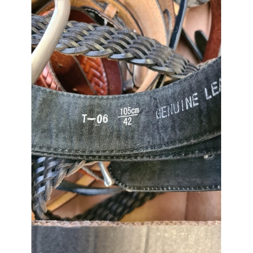 244 - A large collection of leather mens belts - mostly size 42