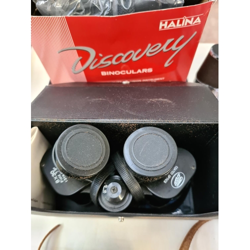 246 - A collection of various optical instruments and accessories to include boxed Halina 8 x 30 Discovery... 