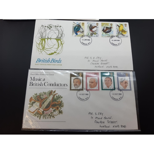 49 - A collection of first day covers ranging from late 1960's/early 1970's in black album together with ... 