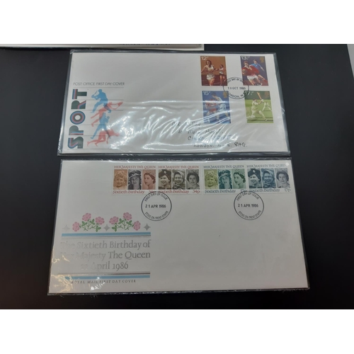 49 - A collection of first day covers ranging from late 1960's/early 1970's in black album together with ... 