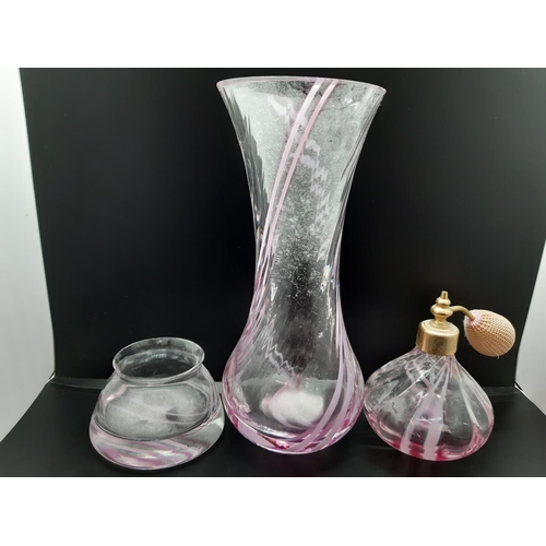 63 - Five pieces of assorted glassware to include a Lalique style dolphin, Lalique style swans and three ... 