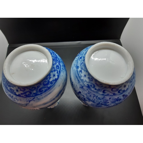 67 - A pair of 19th century Chinese blue and white porcelain vases - approx. 20.5cm high