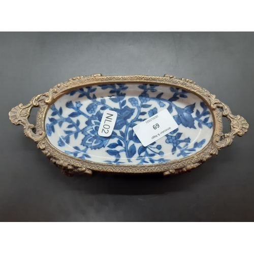 69 - A 19th century blue and white porcelain soap dish with brass mount - approx. 20cm wide