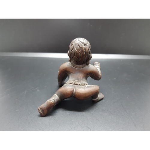 74 - A Hindu crawling Krishna bronze figurine