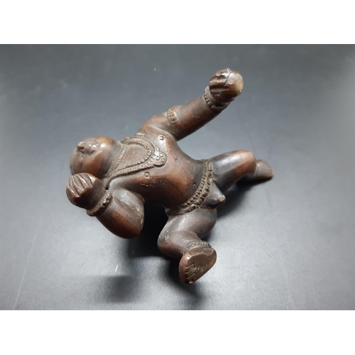 74 - A Hindu crawling Krishna bronze figurine