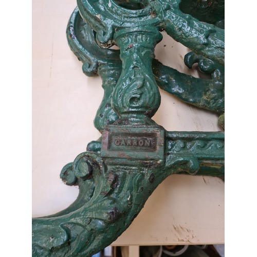 256A - A pair of 19th century Carron No.15 green painted cast iron bench ends