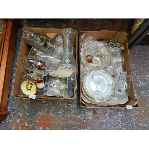 1273 - Two boxes containing glassware and dinnerware to include Palissy plates, Hennessey decanter, 1970s s... 