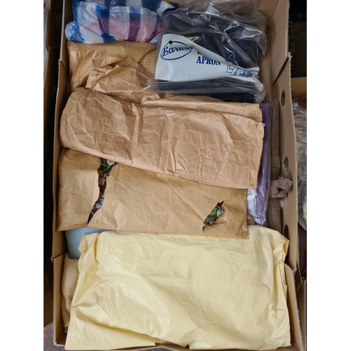 1279 - Ten boxes containing fabric offcuts and sewing equipment