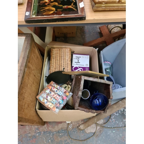 1281 - A large mixed lot to include wicker picnic baskets, metal travel trunk, glassware, books etc.