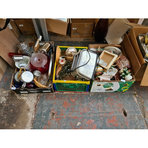 1284 - Three boxes containing red glass fruit bowl, carved wooden deer, stainless steel tea and coffee set,... 