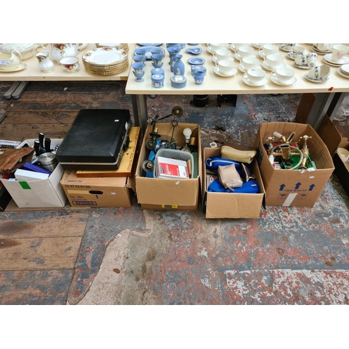 1293 - Five boxes containing brass mixer tap for a shower head, new office stationary,  metal ceiling light... 