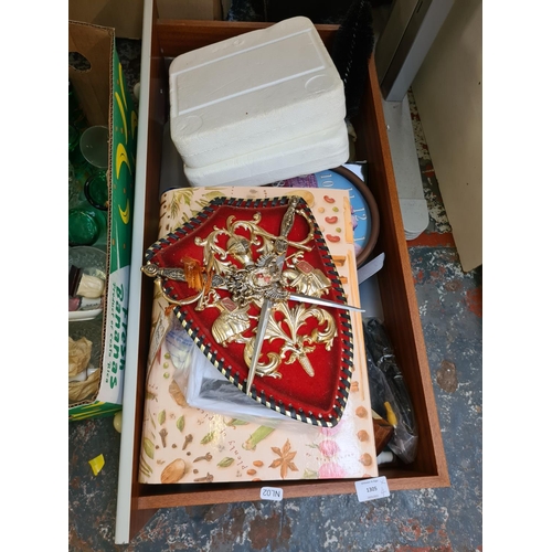 1305 - Three boxes containing set of three coloured Pyrex mixing bowls, 1970s plastic picnic set, carved wo... 