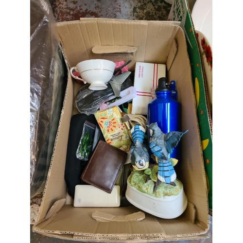 1305 - Three boxes containing set of three coloured Pyrex mixing bowls, 1970s plastic picnic set, carved wo... 