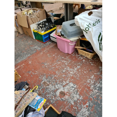 1310 - A large mixed lot to include a pair of brass table lamps, Lervia fan heater, boxed Morphy Richards s... 