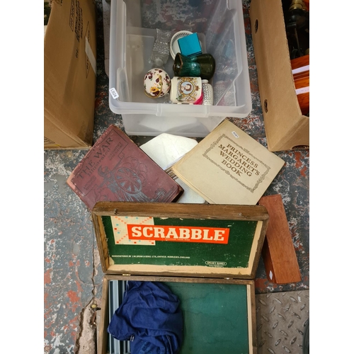 1320 - A box containing vintage Scrabble set, Dominoes, Pall Mall ware collectable plates, The War Illustra... 