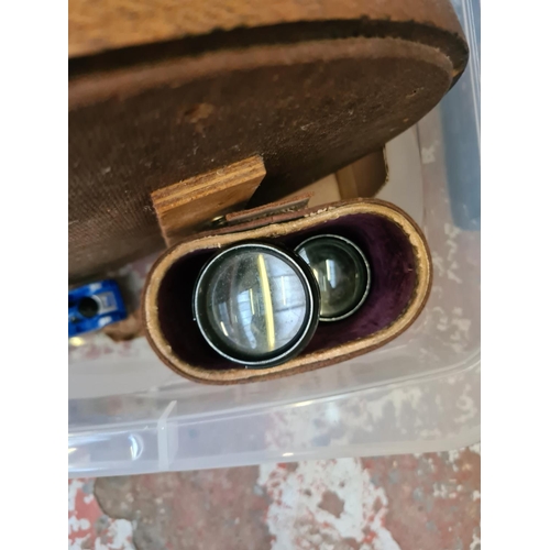 1323 - One box containing small oak framed oval mirror, cased Palar 16 x 50 binoculars, miniature porcelain... 