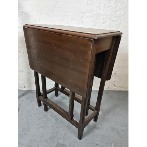 295 - Two items, an elm drop leaf gateleg occasional table and a wooden valet stand