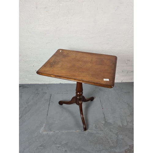 298 - A 19th century walnut tilt top occasional table - approx. 74cm high