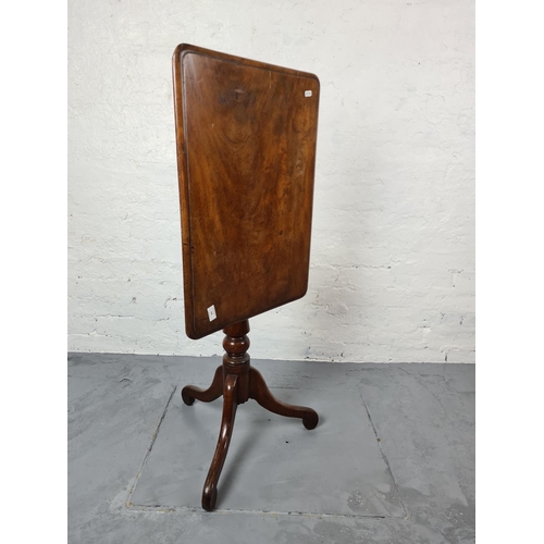 298 - A 19th century walnut tilt top occasional table - approx. 74cm high