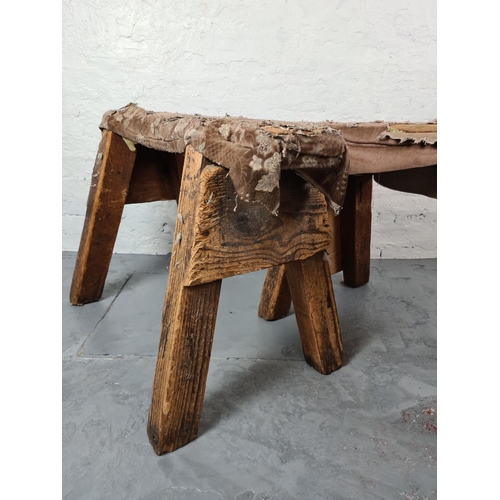 300 - A pair of early/mid 20th century oak work trestles approx. 94cm long x 55cm wide x 65cm high. Have b... 