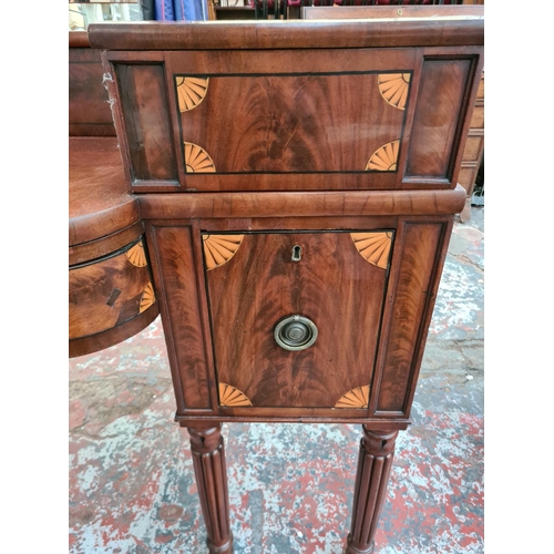 303 - A large George IV inlaid mahogany buffet/sideboard on reeded supports, circa 1825 - approx. 222cm wi... 