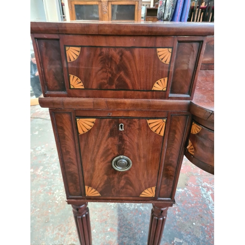 303 - A large George IV inlaid mahogany buffet/sideboard on reeded supports, circa 1825 - approx. 222cm wi... 