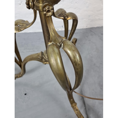 305 - An Art Nouveau brass standard lamp - approx. 163cm with shade