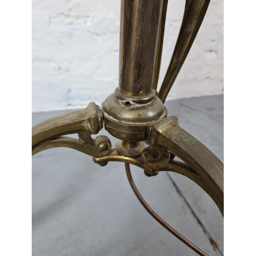 305 - An Art Nouveau brass standard lamp - approx. 163cm with shade