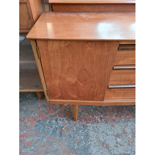 322 - An Austinsuite teak dressing table - approx. 132cm wide x 124cm high with mirror x 42cm deep