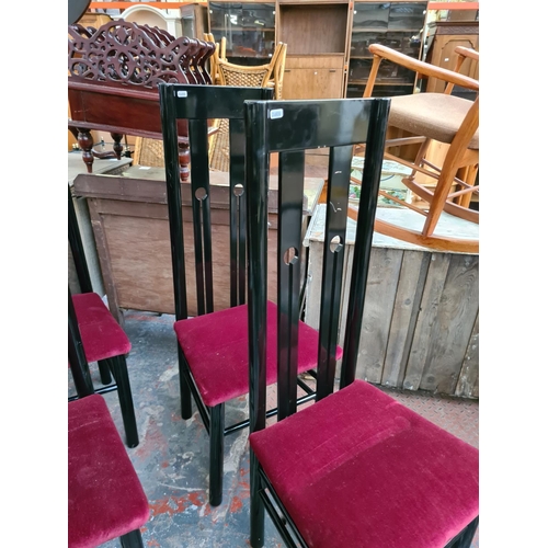 324 - A set of ten contemporary black high back dining chairs in the manner of Charles Rennie Mackintosh