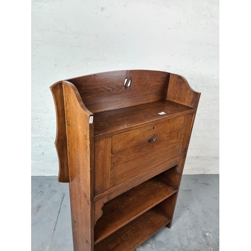 326 - An Arts and Crafts oak bureau - approx. 116cm high x 80cm wide x 23cm deep