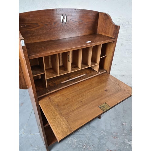 326 - An Arts and Crafts oak bureau - approx. 116cm high x 80cm wide x 23cm deep