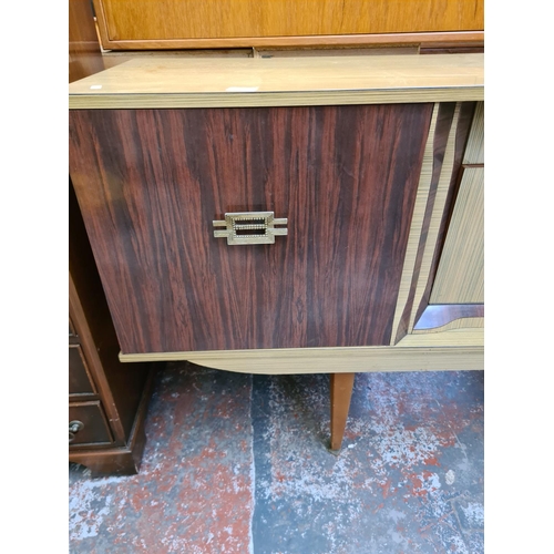 328 - A mid 20 century melamine sideboard - 182cm wide x 79cm high x 43cm deep