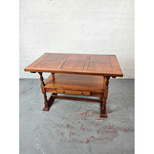 331 - A modern oak monks bench