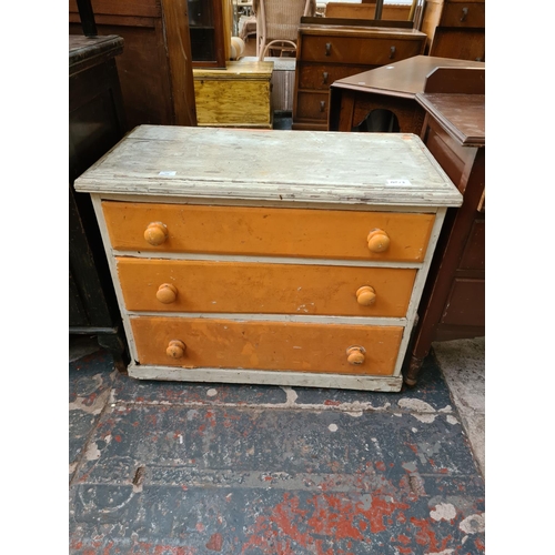 336 - A Victorian white and orange painted chest of drawers