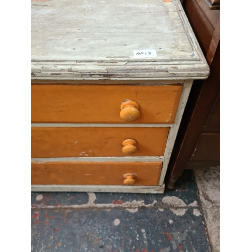 336 - A Victorian white and orange painted chest of drawers