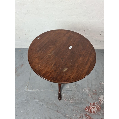 339 - A 19th century mahogany circular tripod tilt top occasional table