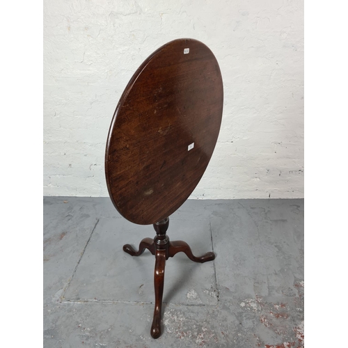 339 - A 19th century mahogany circular tripod tilt top occasional table