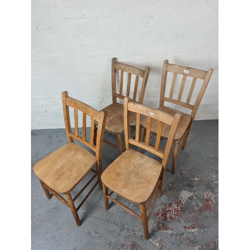 344 - A set of four Simpoles elm and beech dining chairs