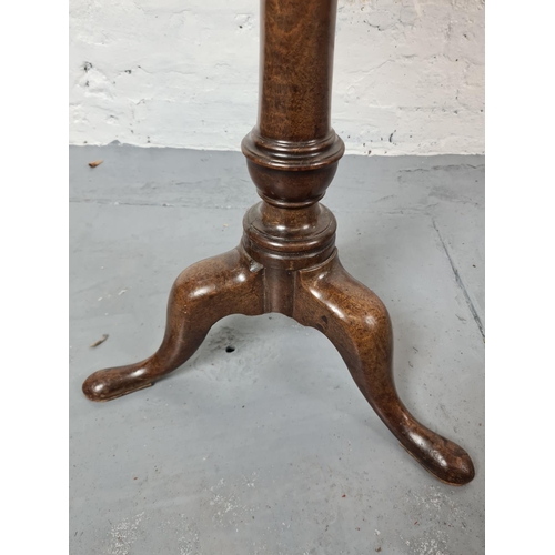 356 - A George III mahogany tripod circular wine table