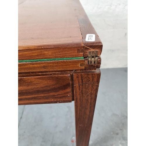 367 - A mid 20th century teak card table with green baize interior - approx. 92cm wide x 71cm high x 51cm ... 