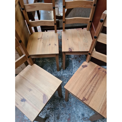 374 - A set of four Mexican pine dining chairs