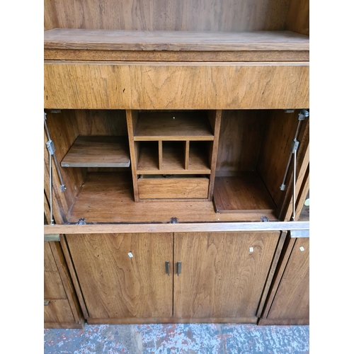 390 - Three mid 20th century American oak cabinets to include two display cabinets with smoked glass doors... 