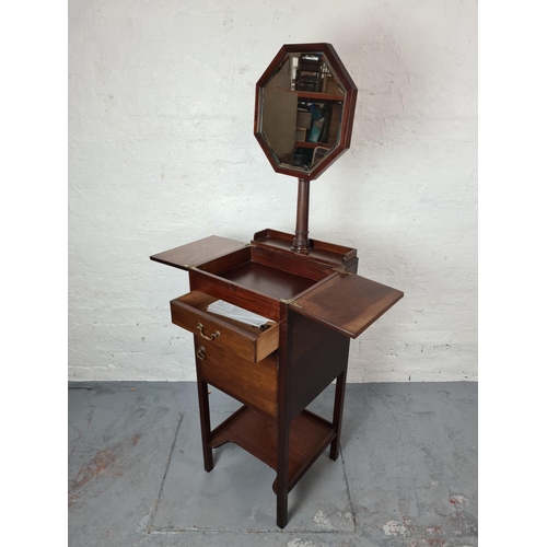 398 - An Edwardian mahogany shaving stand with hexagonal bevelled edge mirror